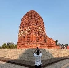 The ancient red brick Laxman Temple in Sirpur, Chhattisgarh, showcasing intricate 7th-century carvings.